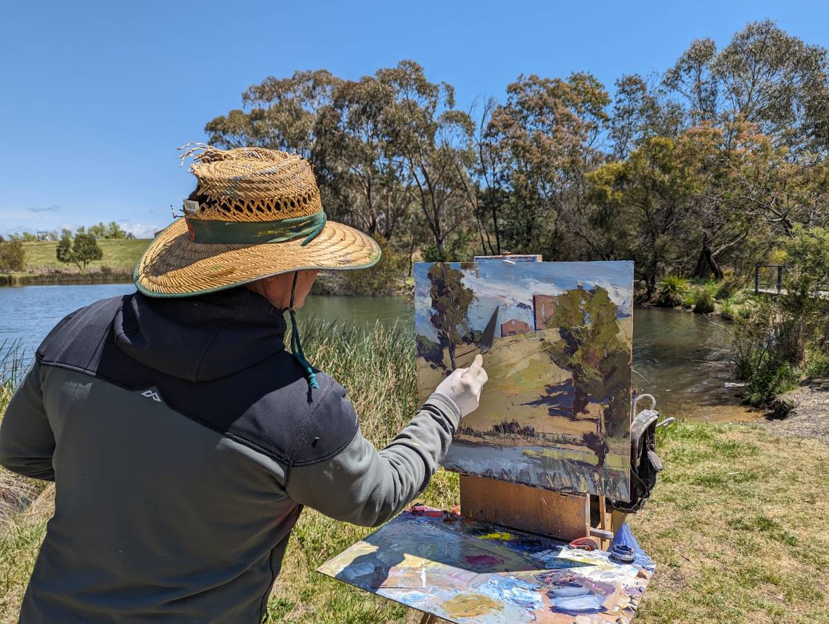 Todd Whisson from Queensland, capturing the light and shadows on the grassy hillside with a palette knife.