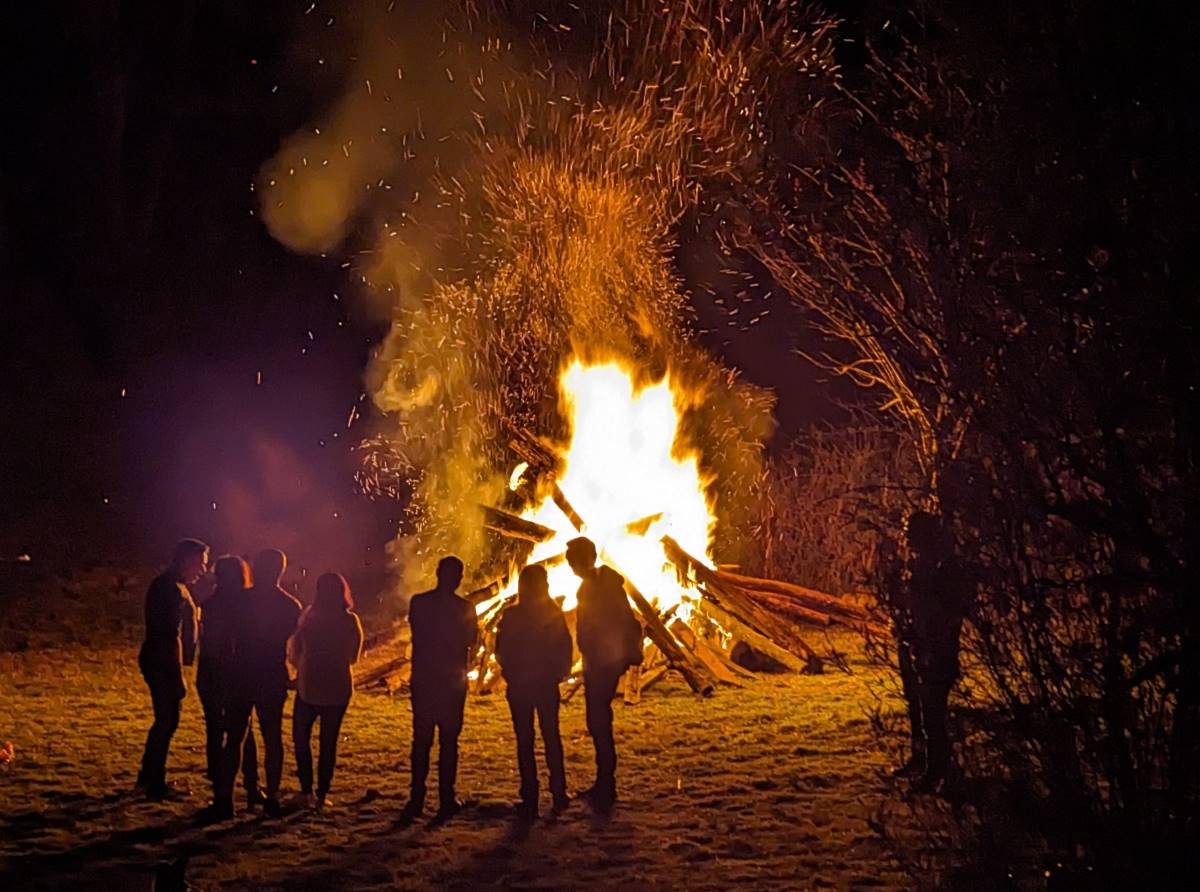 friends around a bonfire