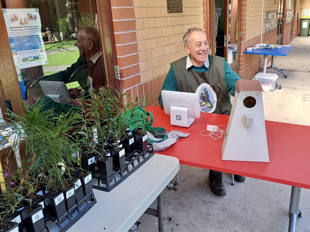 Andrew Solomon of the Blue Mountains Conservation Society selling native plants and nest boxes.